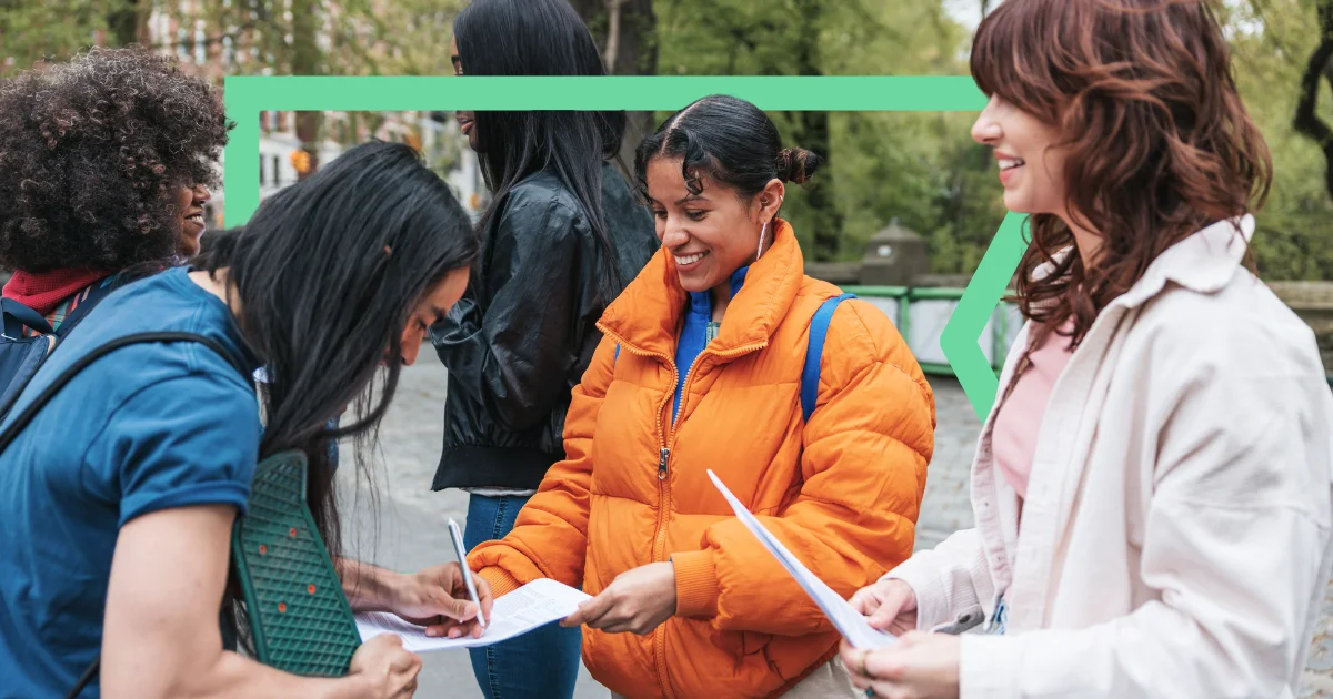 Nonprofit volunteers signing up another volunteer