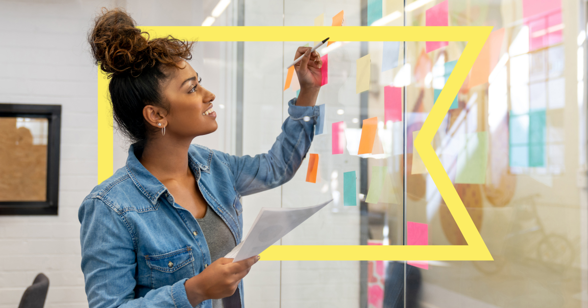 Woman brainstorming in an office